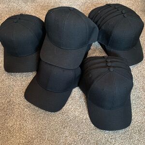 Set of about 20 black baseball caps